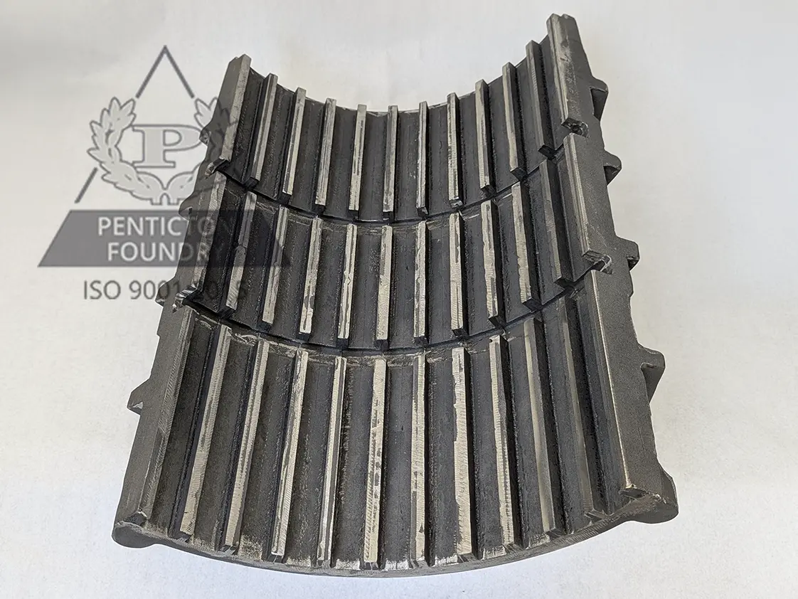 Ductile iron shoe segment for adjustable main shaft bearing, hydroelectric industry. Ductile iron shoe segment for adjustable main shaft bearing, hydroelectric industry.